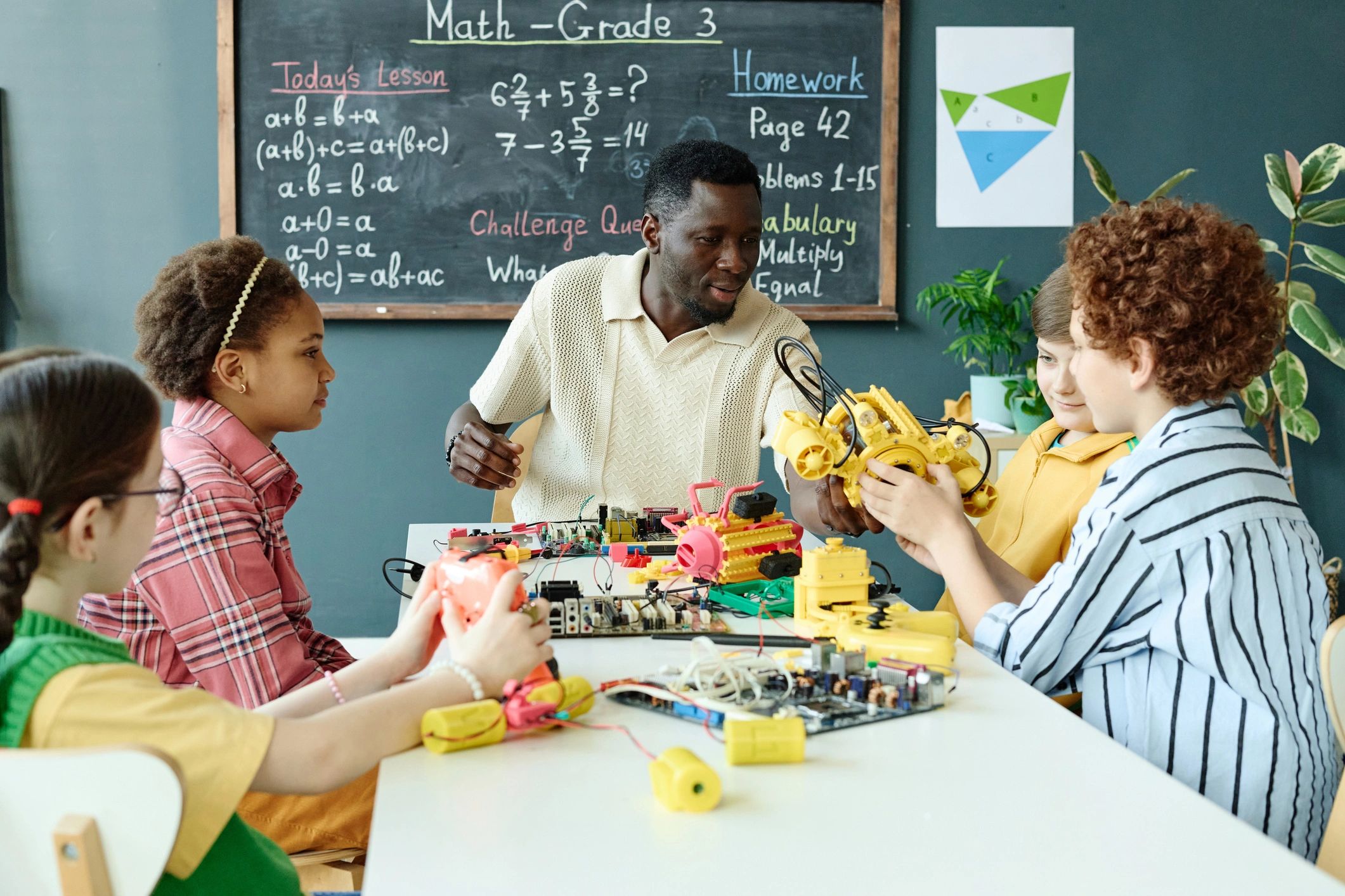 Children collaborating on a creative STEM toy activity